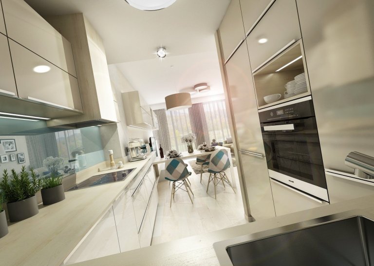 Brněnský byt je z&nbsp;většiny navržený v&nbsp;bílo-béžové kombinaci občas doplněné modrou a koňakovým dekorem dubu. V&nbsp;obývací části je kuchyňská linka…