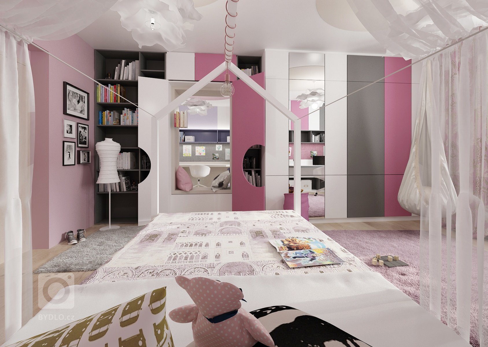 Dva pokoje pro dvě sestry vzájemně propojené průchodem skrz skříně. Pokoj starší dívky je v&nbsp;růžové, antracitové a bílé barvy. Nad postelí je rámová…