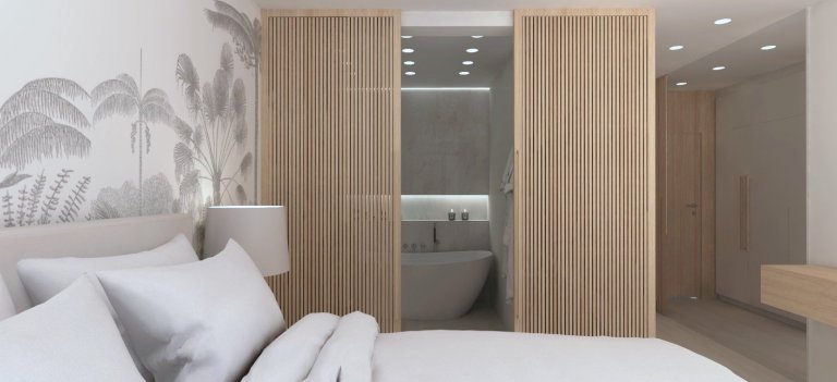 Návrh prázdninového apartmánu ve slunné Andalusii. Posuvná stěna z dřevěných lamel odděluje koupelnu s dvěma umyvadly a volně stojící vanou. Ložnice disponuje…