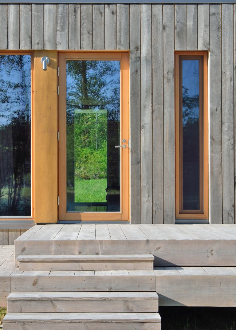 Skvěle řešená finská dřevostavba u jezera