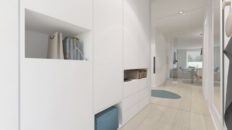 Útulnú atmosféru v interiéri sme dosiahli kombináciou bieleho nábytku s akcentmi dreva, sivej, čiernej a na oživenie interiéru sme použili modrú farbu.

…