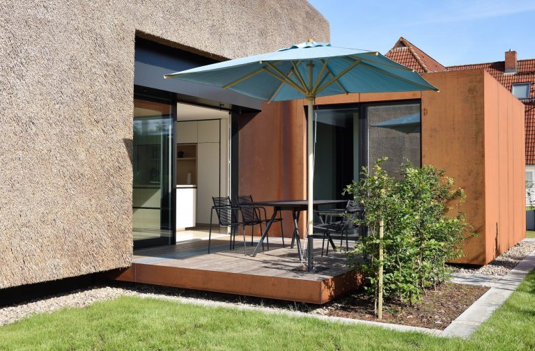 Dům s rákosovou fasádou