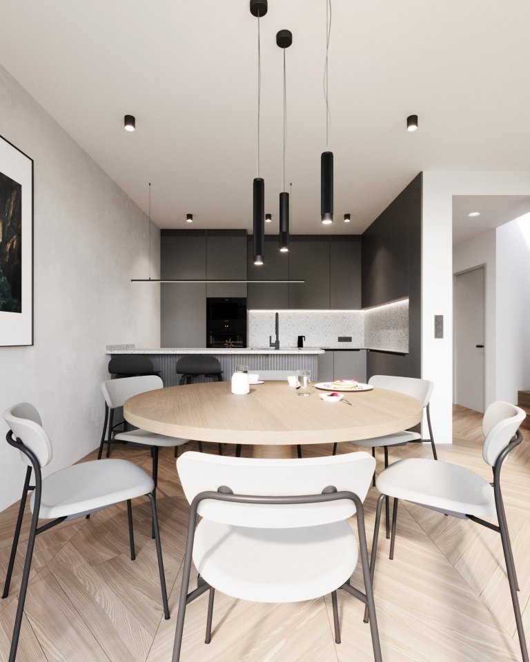 Otevřenosti a vzdušnosti prostoru nahrává spojení kuchyně s jídelnou a obývacím pokojem. ⁠⁠Interiér je definován tmavší dubovou podlahou s klasickým francouzským vzorem. Parkety jednotlivé místnosti přirozeně propojují a vytváří tak kompaktní celek.