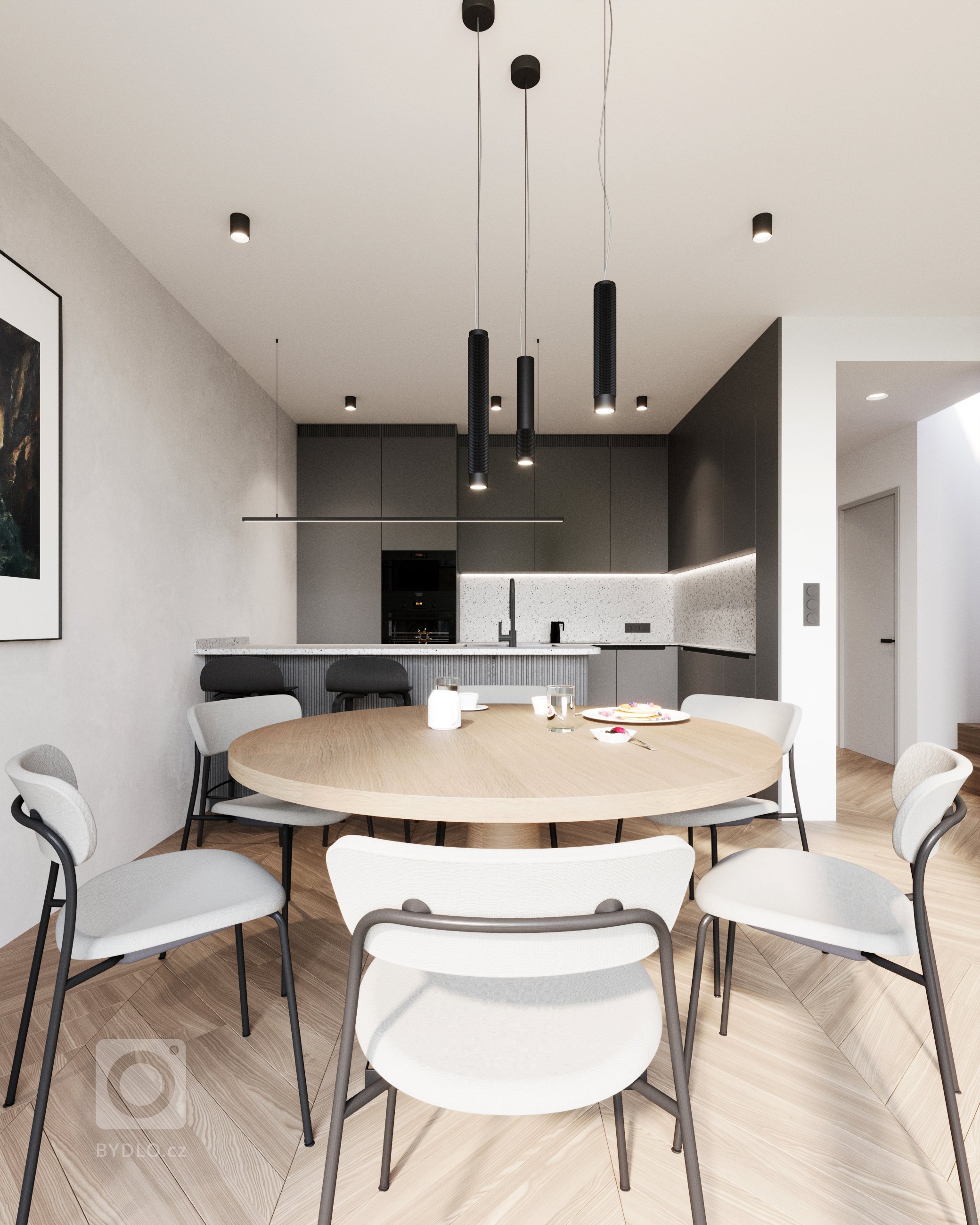 Otevřenosti a vzdušnosti prostoru nahrává spojení kuchyně s jídelnou a obývacím pokojem. ⁠⁠Interiér je definován tmavší dubovou podlahou s klasickým francouzským vzorem. Parkety jednotlivé místnosti přirozeně propojují a vytváří tak kompaktní celek.