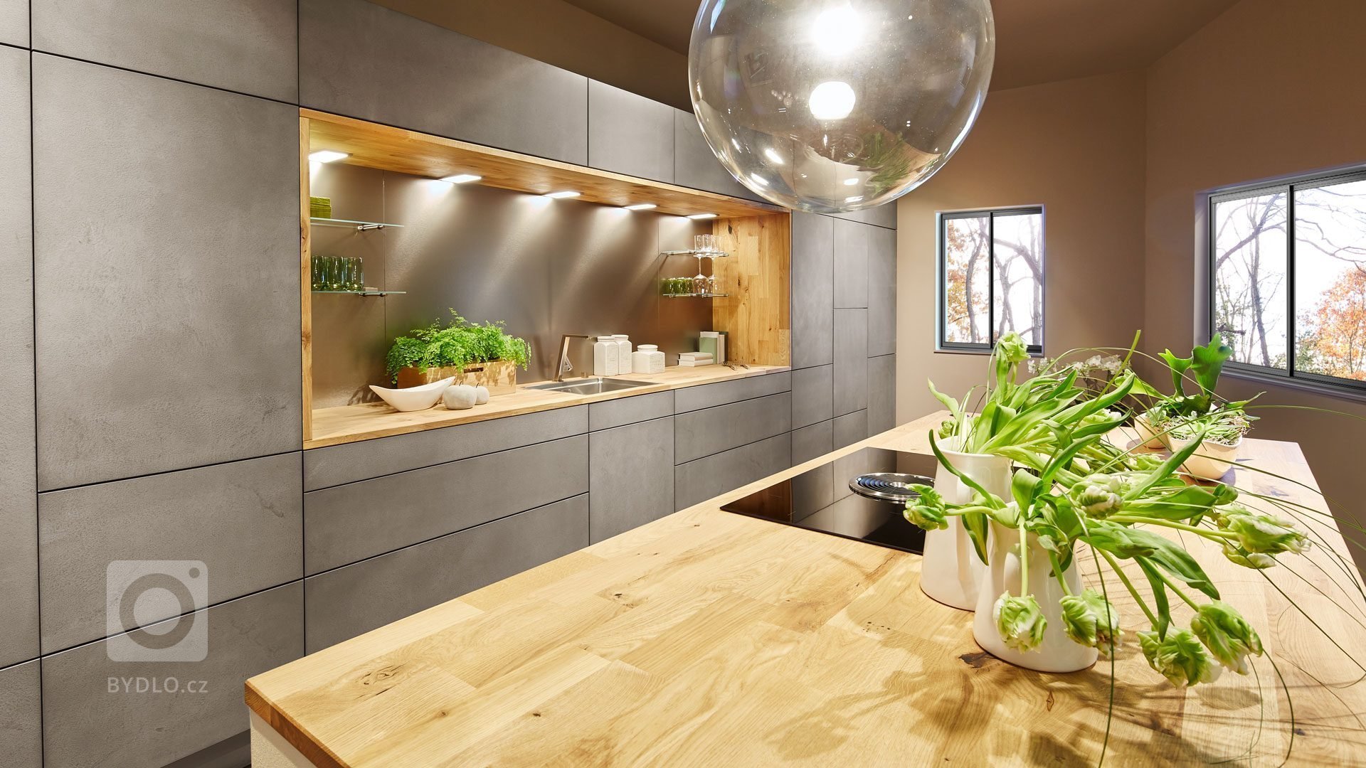 Jedná se o kuchyňskou linku v minimalistickém designu. Materiál dvířek&nbsp;&nbsp;je keramická stěrka, která je ručně nanášená na podkladový materiál. Každé…